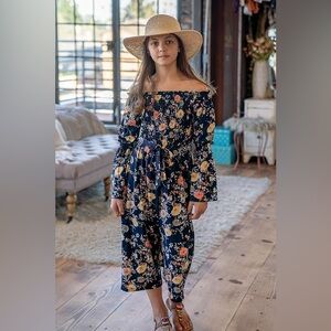 SMUKKE FLORAL PRINT NAVY SMOCKED & RUFFLE DETAILS, TIE SHOULDERS, JUMPSUIT